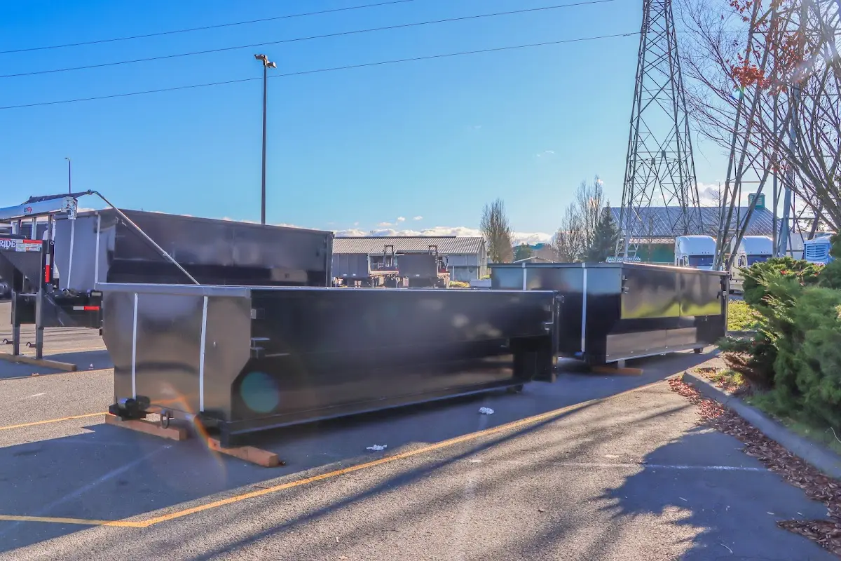 Roll-off dumpster ready for waste disposal at job site for Construction Dumpster Rental in Muskogee